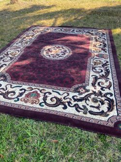 Persian rug  approximately 10’ X 8’