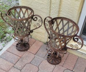 2 antique metal outdoor plant holders