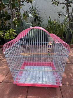 Medium bird cage with a toy and swing