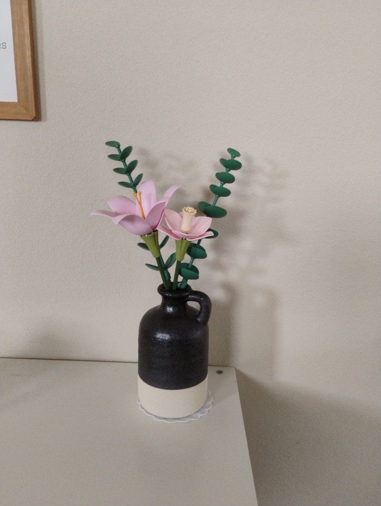 Vase With Rolife Flowers