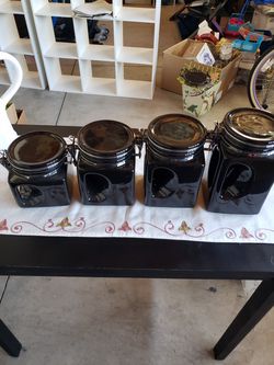 4 ceramic black canisters