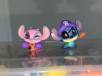 Disney doorables Halloween 2025 angel and stitch