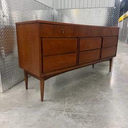 Professionally restored vintage mid century modern all natural walnut finish bedroom set by Dixie located near the Miami Design District.  The set inc