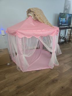 Little girls play tent