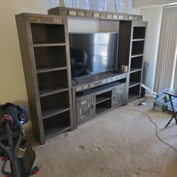 Need Gone Today 55 Inch TV, Entertainment Center, Soundbar W/ Subwoofer