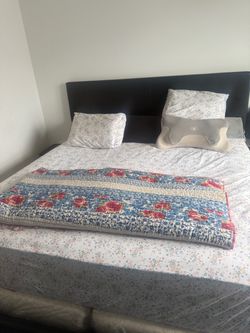 King-size bed frame with headboard