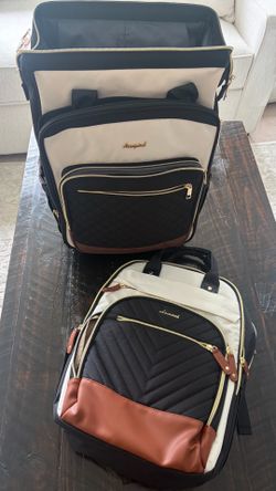 Brand new roller bag with matching smaller bag