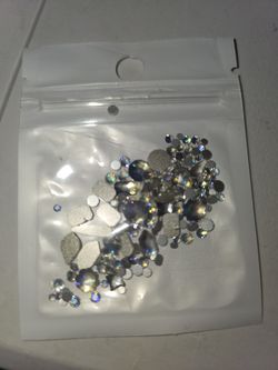 150pcs Clear Crystal Stones - 3D Nail Art Glitter, Flatback Diamonds, and Hot Fix Rhinestones for DIY Crafts, Clothing, and Dress Decoration -