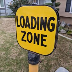 VINTAGE PORCELAIN "LOADING ZONE " PARKING SIGN AND STAND....asking $120.00