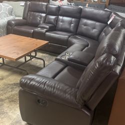 Chocolate leather like recliner sectional $2000