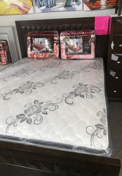 Queen bedroom suite, complete with headboard,footboard,rails,dresser and mirror,chest,night stand, mattress and box