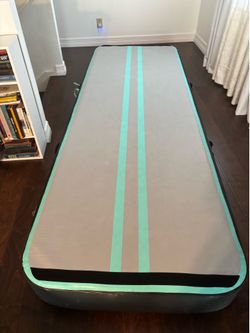 Gymnastic tumbling inflatable air mat