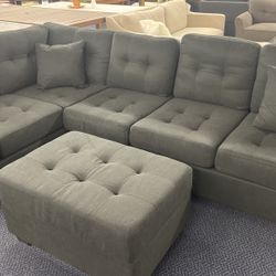 Sectional W/ Drop Cup Holder And Storage Ottoman 