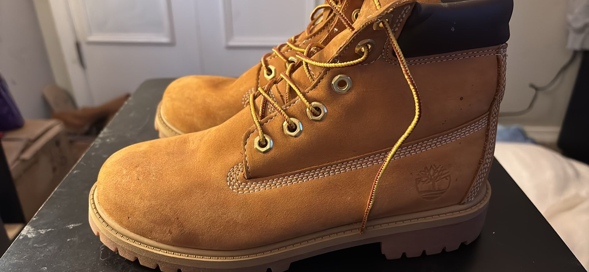men’s timberlands size 6 , women’s size 8