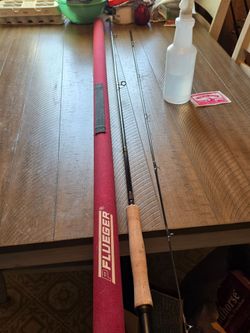 Fly fishing pole and cashew never used