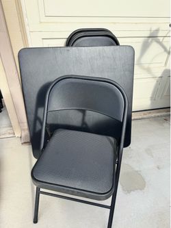 Card table with folding chairs