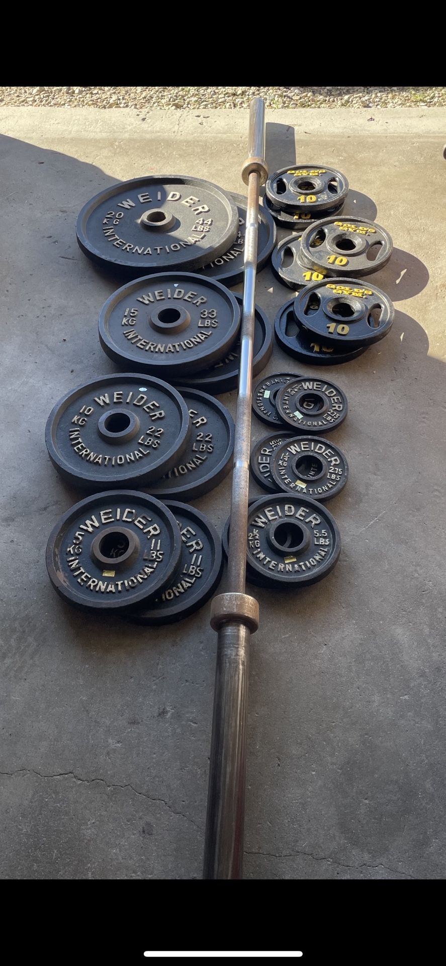 302lbs Olympic weights+barbell