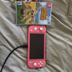 Nintendo Switch Lite + 2 Games + microSD + Charger
