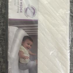 NEW BABY CRIB WEDGE
