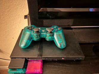 Ps2 slim memory’s cards and 2 controllers