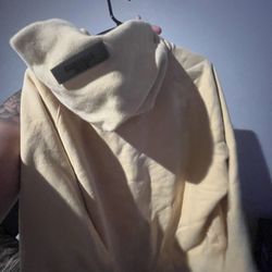 Yellow essential hoodie size XL fits like a large