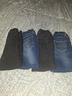 Size 5 boys jeans brand is children's place total price 4 pair Jeans 16 dollars