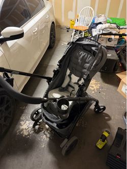 Baby stroller with car seat attachment