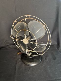 General Electric black vintage oscillating fan