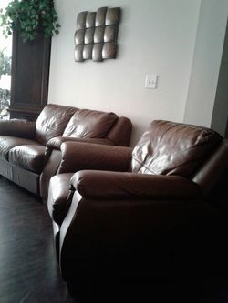 Beautiful New Luxury Leather Loveseat & Matching Recliner $450. FIRM !!