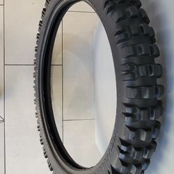 Motocross Dunlop tire. ( Size: 3.00 X 21 or Metric Size: 90/90-21.