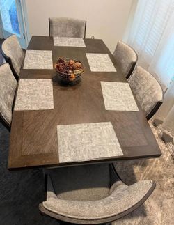 Table, 6 chairs, and a buffet