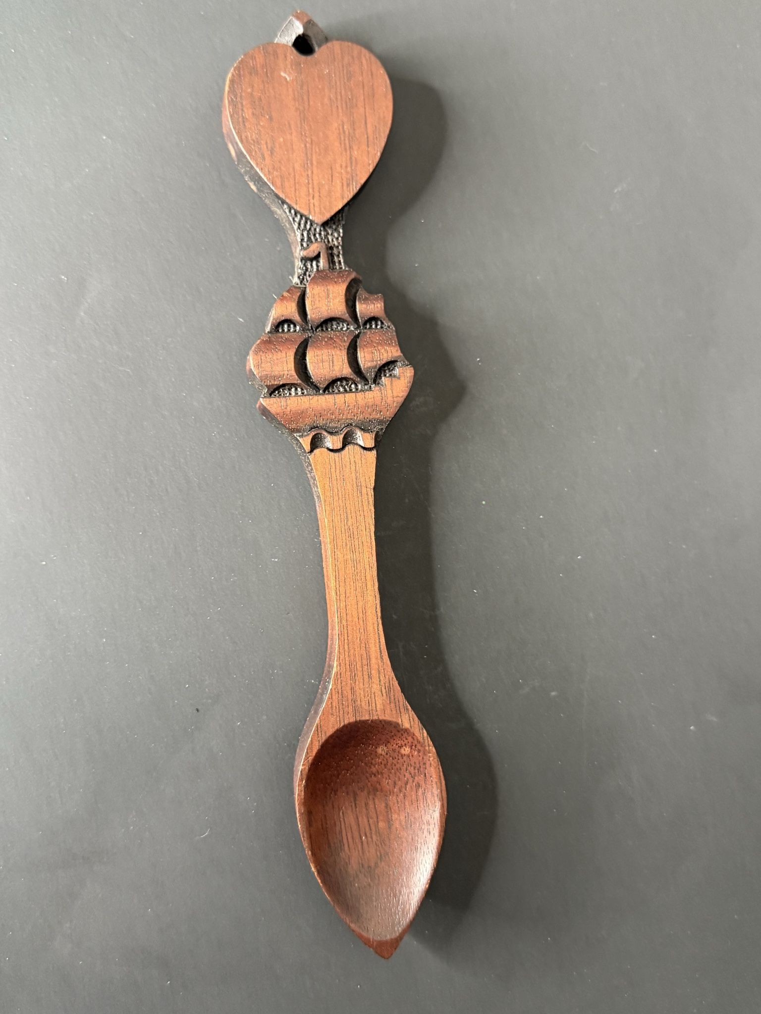 Vintage real wood spoon with heart and pirate ship