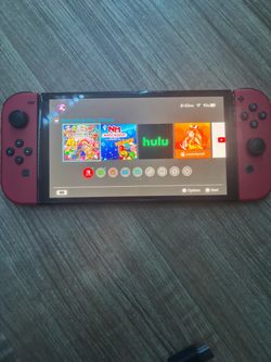 Nintendo switch oled with smash bros ultimate