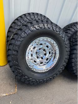 NEW 17x9 fittipaldi wheels mirror chrome wrapped in 35x12.50r17 atturo mt tires