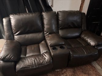 Dark Brown Leather type Reclining Loveseat with Console