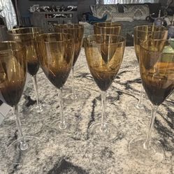 Set of brown clear stem water/wine goblets.