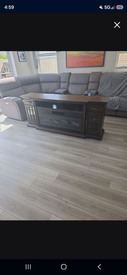 Sectional couch and electric fireplace