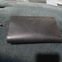 Michael korse wallet