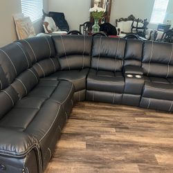 New 3 Reclining Sectional.  Black Or Brown Leather.  100 X 112 X 38H.  Free Delivery!