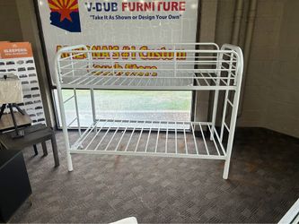 White metal twin bunk bed