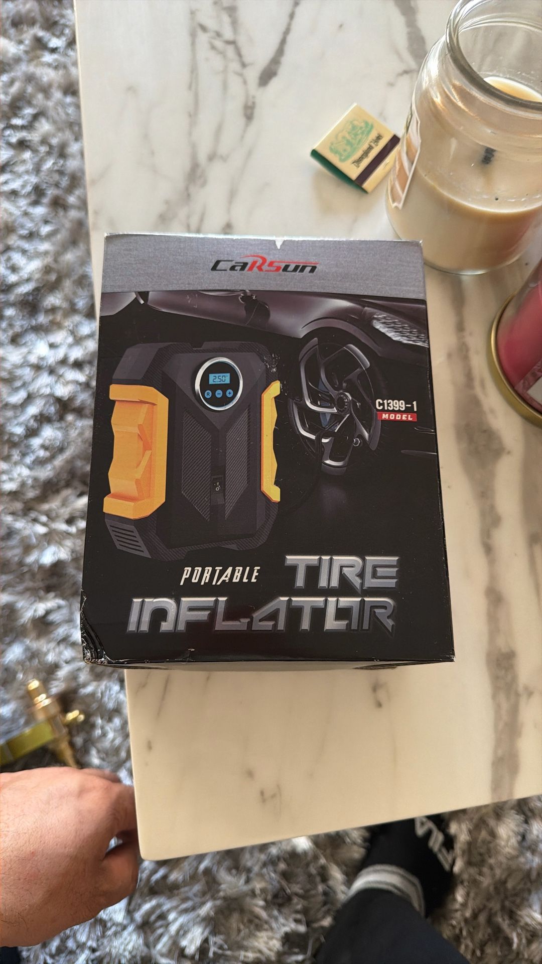 Carsun C1399-1 portable tire inflator.