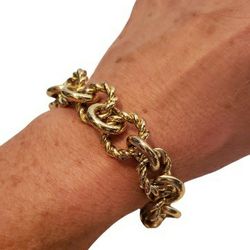 J.Crew thick goldtone metal bracelet with lobster clasp.

