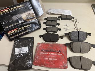 Ford Escape 2015 Ceramic Disc Brake Pads and two Rotors for a 2015 Ford Escape