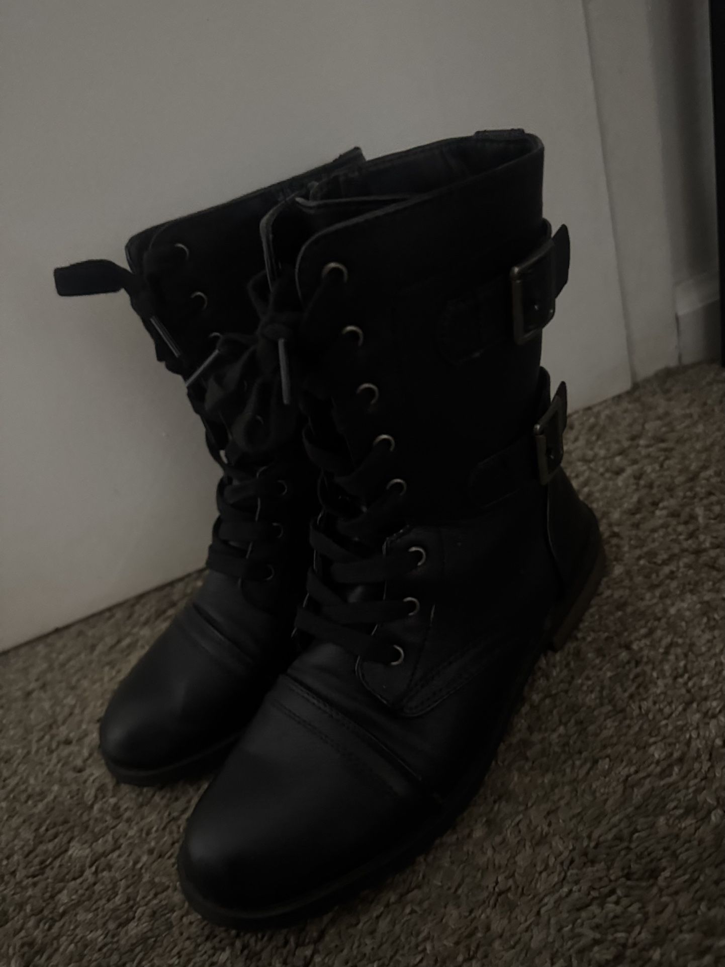 Black flat combat boots