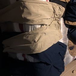 Pantalones De Uniforme Azul Y Tan