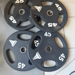 Commercial urethane Olympic  45lbs pairs 90$ a pair like new