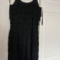 It’s Very Cute Short Cocktail Dress The Size Is Six. The Color Is Black. It’s All Tassel.Dress 