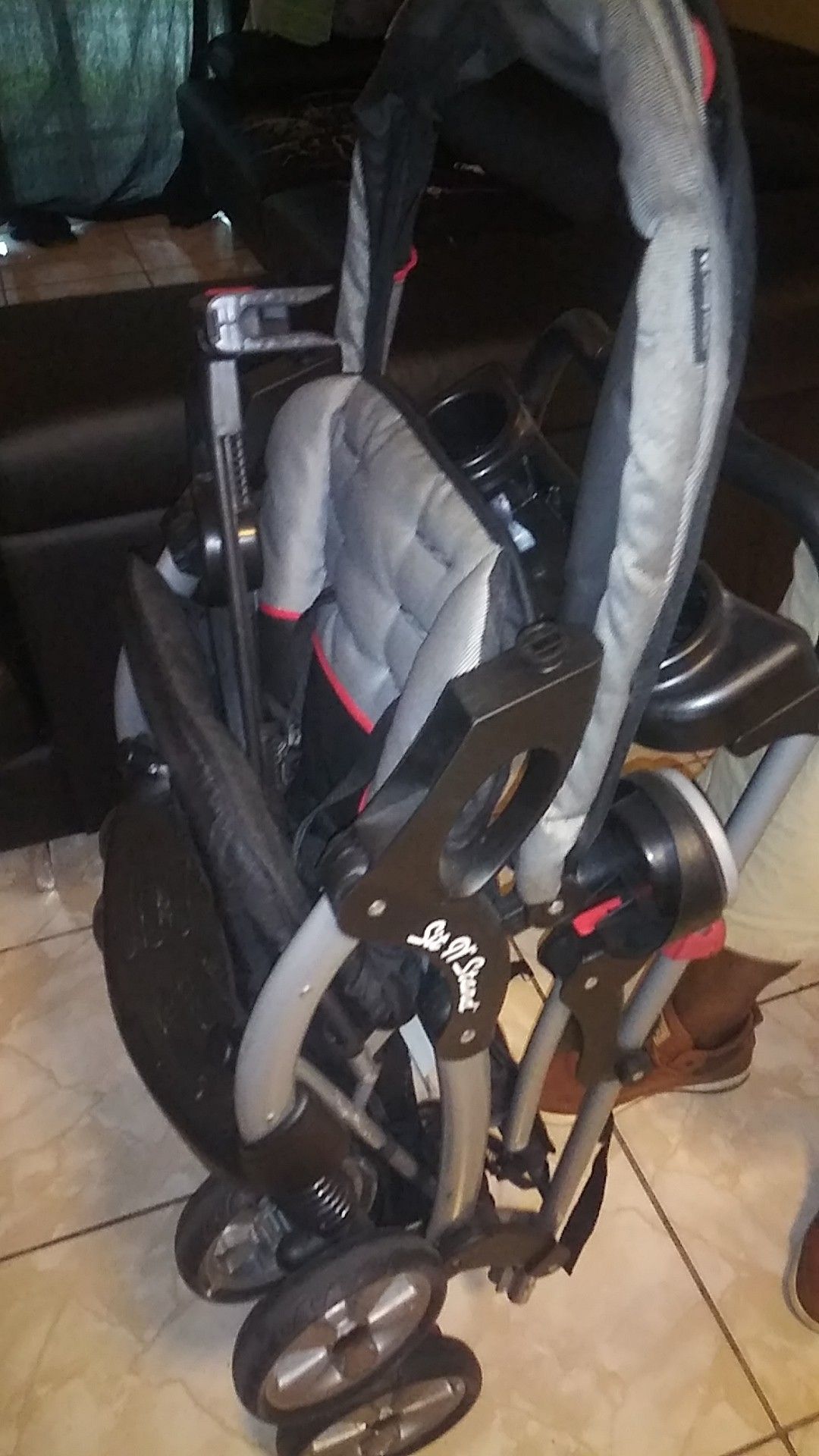 Double sit and stand stroller