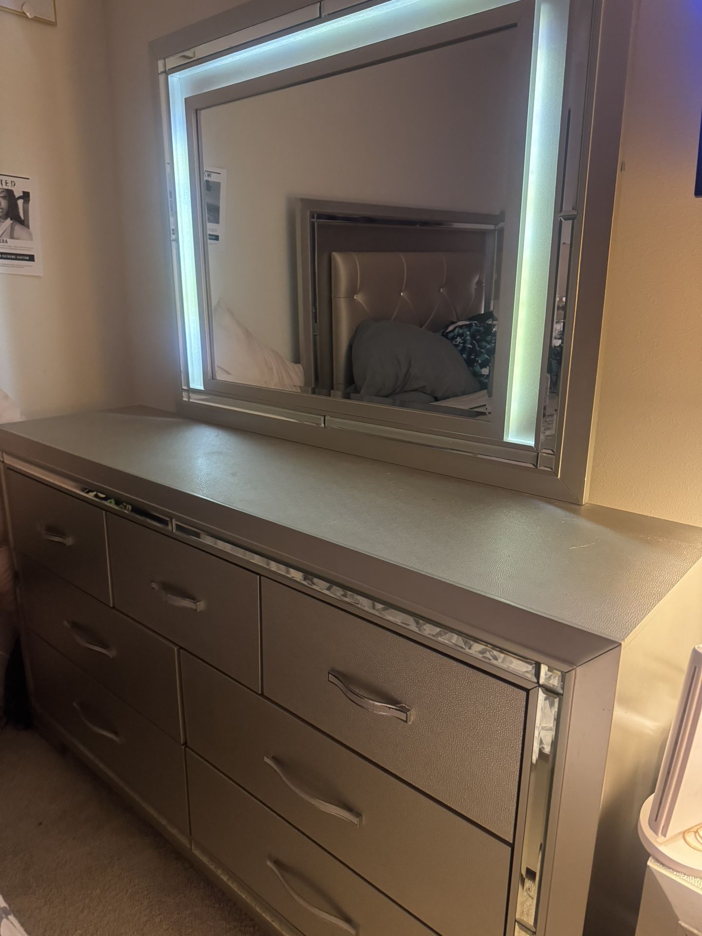 Dresser with lighted mirror