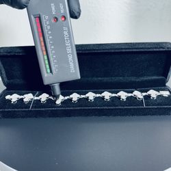 Silver moissanite cross bracelet